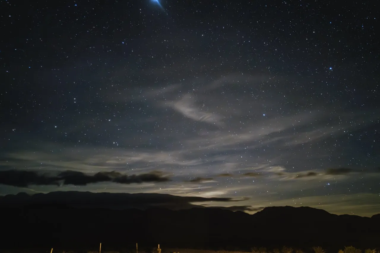 Night sky over Minieta Road, Death Valley, photographed by Yasushi Oh